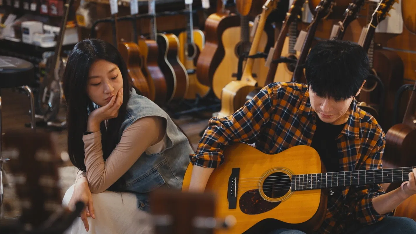 Парень с гитарой